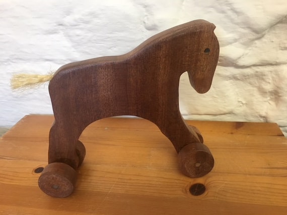 wooden horse on wheels