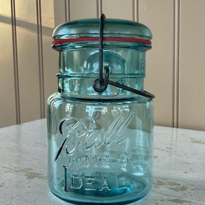 1920’s blue glass Ball jar Ideal jar Pint size vintage canning jar with lid and wire bale