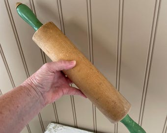 Munising signed Wooden rolling pin with green wooden handles