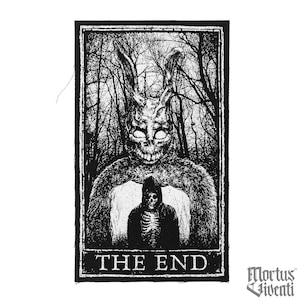 May include: Black and white illustration of a rabbit monster with glowing eyes and a skeletal figure in a hooded cloak. The image is framed in a black border and has the text "THE END" at the bottom.
