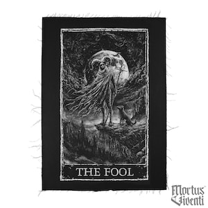 May include: Black and white tarot card patch featuring an illustration of The Fool. The image depicts a robed figure with horns, a staff, and a dog, set against a moonlit, gothic landscape. The text "THE FOOL" is at the bottom.