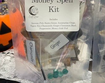 May include: A clear plastic bag filled with various herbs, crystals, and other ingredients for a money spell kit. The bag includes Palo Santo, green aventurine chips, tiger's eye, chamomile, ginger, cinnamon, basil, peppermint, money, and gold foil. The bag has a label that reads "Money Spell Kit" and lists the ingredients included.