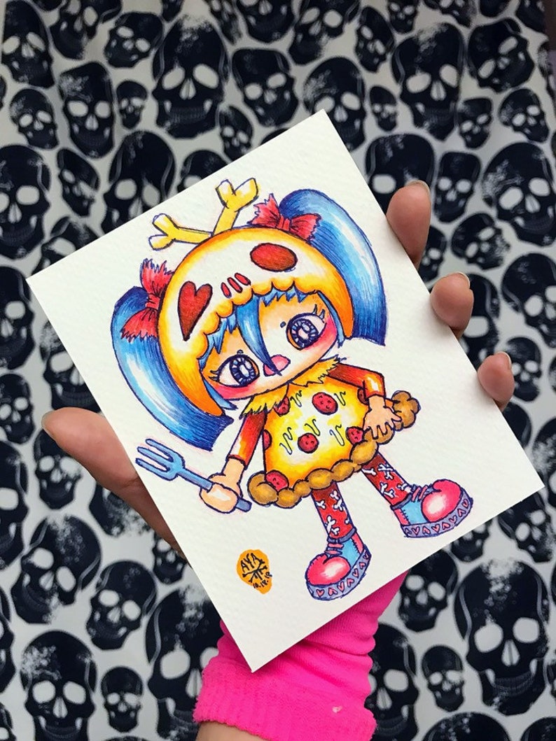 May include: A vibrant illustration of a cartoon character with a skull-shaped head, blue hair, and a pizza-themed dress, holding a fork. The artwork is signed and dated. The background features a pattern of black skulls on a white surface.