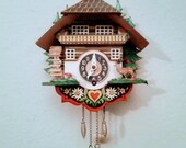 1970 Swiss chalet wind-up pendelum wall clock, looks new, keeps good time, offered by original owner FREE SHIPPING