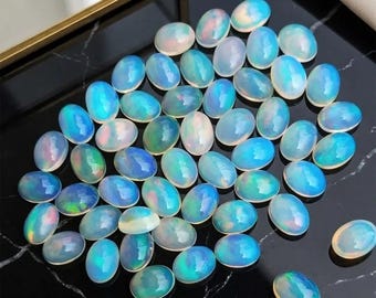 きらびやかなエチオピア産オパールカボション：手作りのオーバル型宝石セット