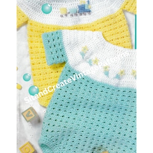 May include: Two crocheted baby onesies, one in yellow and white with a train design, and the other in turquoise and white with a floral design.