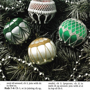 May include: Three crocheted Christmas ornaments, one white, one green, and one white with gold trim. Each ornament is decorated with white beads and has a loop for hanging.