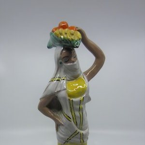 Vintage mid century glazed pottery figurine Woman bearing fruit on her head Italian ? 1960s Decorative ceramic figure Exotic style sculpture