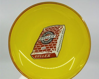 Funky vintage Swedish yellow glass dish or tray w/ Advertisement for Gullex masonry cement 1950s 1960s Pop art design Unique interior accent