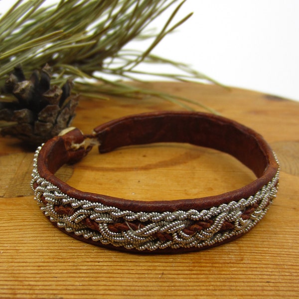 Vintage Swedish hand crafted leather Sami bracelet embroidered with pewter beads Nordic folk art Lapland metal crafts Scandinavian jewelry