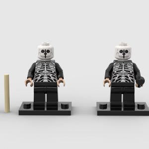May include: Two Lego skeleton minifigures with black jackets and pants, white skeleton torso print, and white skull heads. Two tan Lego cylinders are to the left of the figures. The figures stand on black Lego bases.