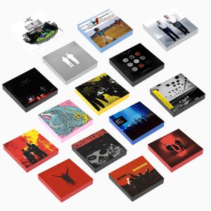 May include: A collection of fifteen square music album covers arranged in a grid, featuring various graphic designs, photographic portraits, and illustrations with distinct color palettes including red, black, yellow, blue, and white.