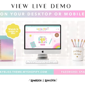 May include: A desktop computer displaying a website titled Sunday Bliss Creative Co. with a Shop Our Best Sellers banner. Beside it are two spiral notebooks in a clear holder, a mug with the text good things take time, and a gold stapler.