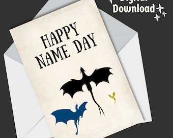 May include: A digital download of a greeting card with the text "Happy Name Day" and three dragons. The dragons are black, blue, and gold.