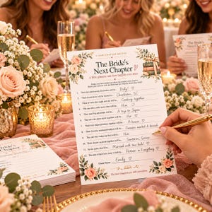 May include: A white paper bridal shower game card titled The Bride's Next Chapter with floral illustrations, a stack of books, and twelve numbered questions filled out with handwritten text, including a guest name line at the bottom.