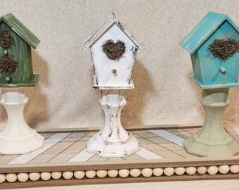 Birdhouse on pedestal