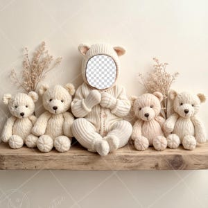 May include: Five cream-colored teddy bears, including a larger one wearing a cream-colored knitted outfit, are arranged on a wooden shelf. The larger teddy bear has a blank space for a face.