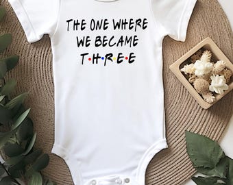 Pregnancy Announcement Baby Onesie® Bodysuit -  The One Where We Became Three -  TV Inspired