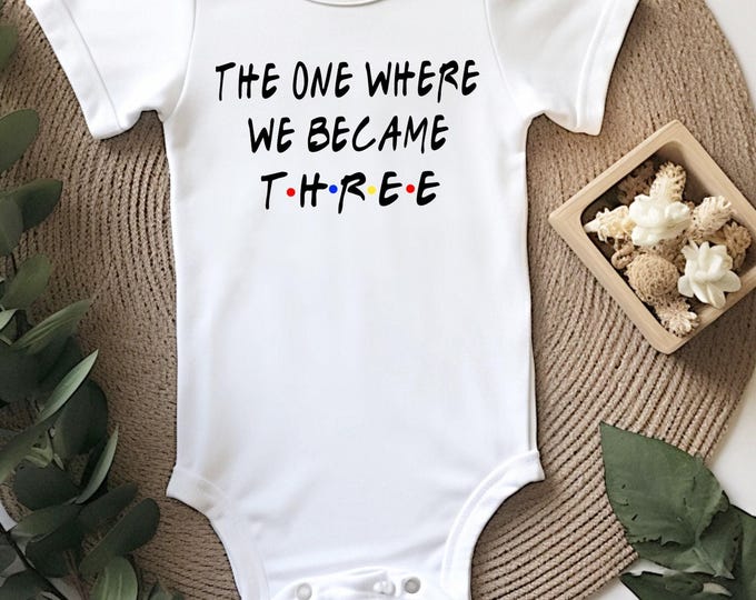 Pregnancy Announcement Baby Onesie® Bodysuit -  The One Where We Became Three -  TV Inspired