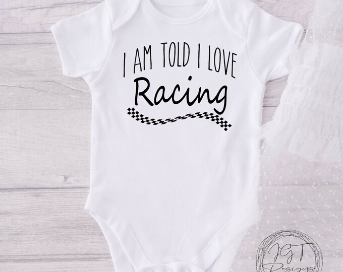 I Am Told I Love Racing Baby Onesie® Bodysuit - Funny Bodysuit