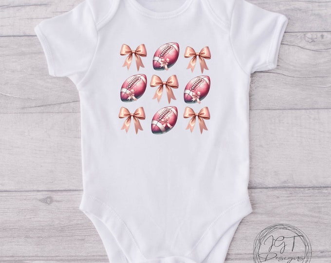Coquette Football Baby Onesie® Bodysuit - Pink Football Bow