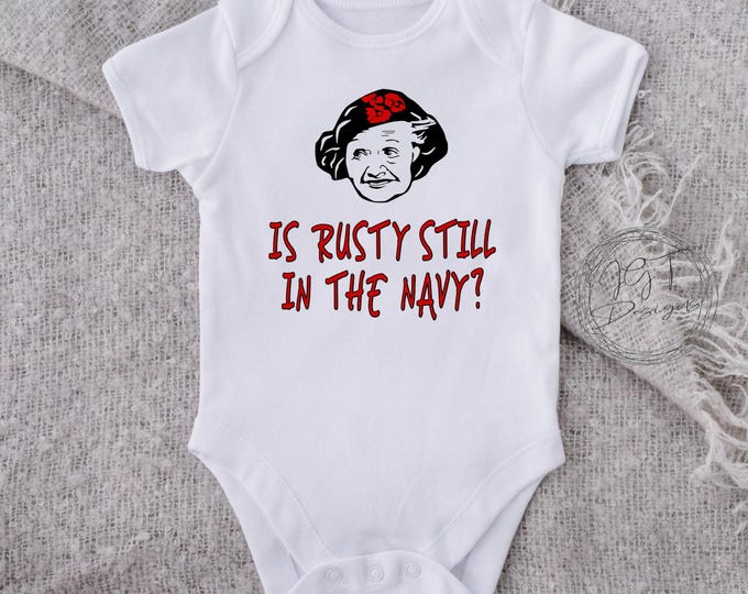 Is Rusty Still In The Navy Christmas Baby Onesie® Bodysuit - Christmas Vacation Inspired