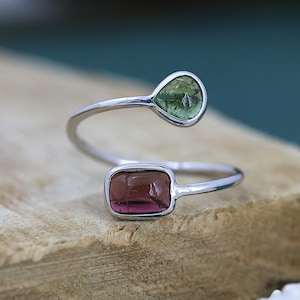 Toi et Moi-ring i sterlingsilver: Grön och rosa turmalin-bypassring