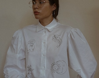 Hand embroidered white shirt with puff sleeves
