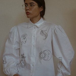 Hand embroidered white shirt with puff sleeves