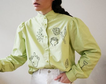 Hand embroidered pistachio green shirt with puff sleeves