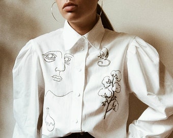 Hand embroidered white shirt with puff sleeves