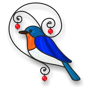 May include: A stained glass bluebird with an orange breast and white belly. The bird is perched on a black metal swirl with three red glass beads.