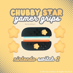 Op de afbeelding: Zwarte en oranje Nintendo Switch 2 gamer grips met stervormige accenten. De afbeelding bevat de tekst "CHUBBY STAR gamer grips" en "nintendo switch 2".