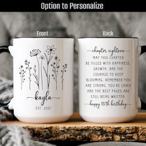 May include: White 15oz mug with a black handle and rim. The front features a floral design with the name "kayla" and the year "2007". The back has the text "chapter eighteen" and a birthday message.