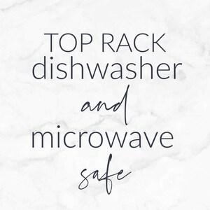 May include: Text on a white marble background that reads "Top rack dishwasher and microwave safe".