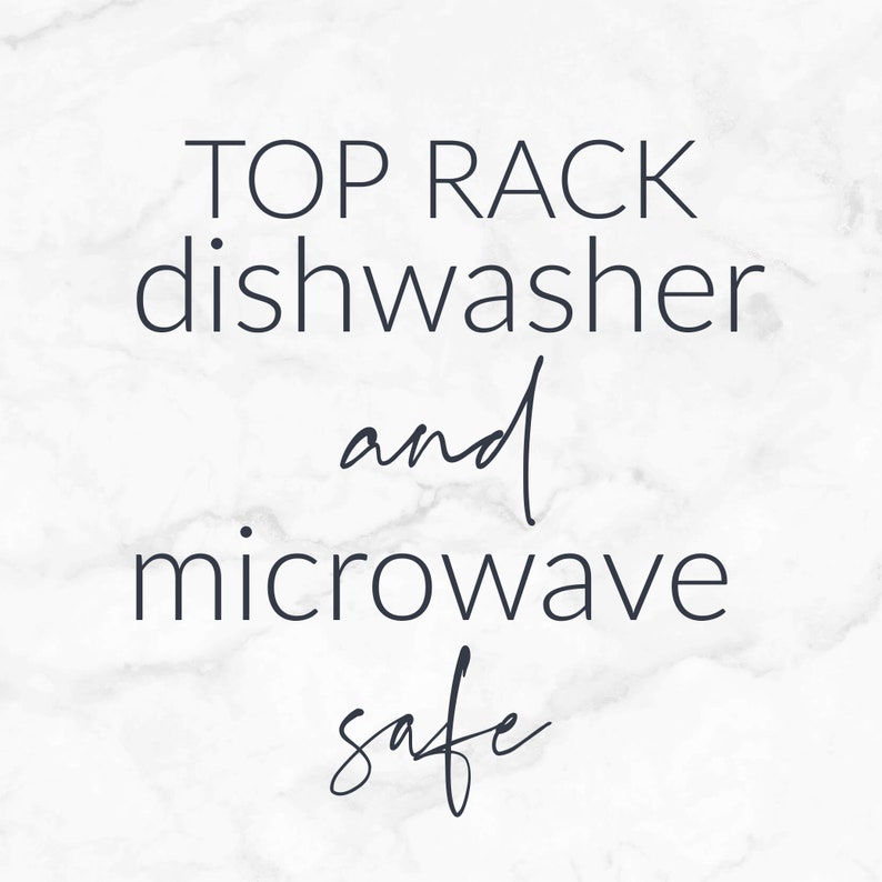 May include: Text on a white marble background that reads "Top rack dishwasher and microwave safe".