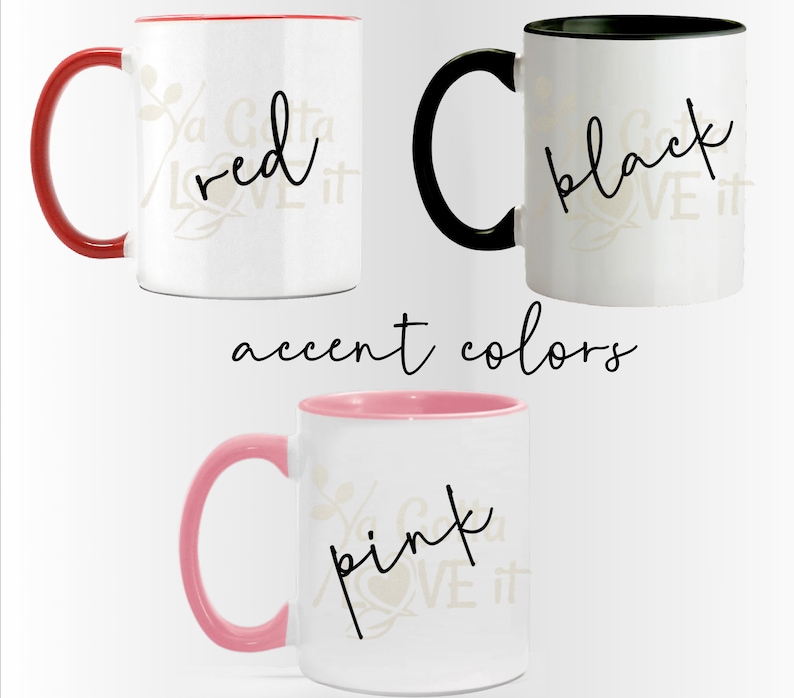 May include: Three white ceramic mugs with different colored accent rims. The mugs have a black cursive design that says "Ya Gotta Love It" with a different color word in the middle of the phrase. The colors are red, black, and pink.