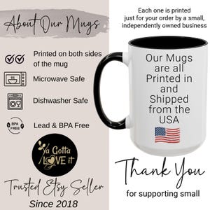 May include: White mug with a black handle and rim, featuring text that reads "Our Mugs are all Printed in and Shipped from the USA." The mug also has the American flag printed on it. The mug is microwave and dishwasher safe.