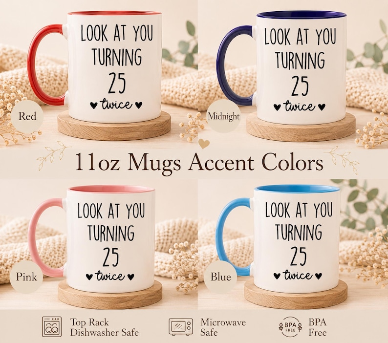 May include: Four 11oz ceramic mugs with white exteriors and colored handles and interiors in red, midnight blue, pink, and light blue. Each mug features the black text "LOOK AT YOU TURNING 25 twice" with small heart icons on the front surface.