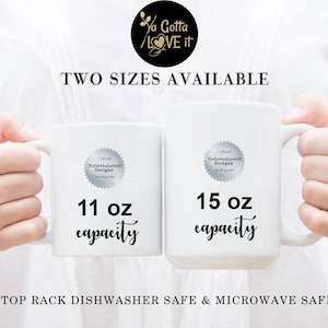 May include: Two white ceramic mugs with black text. The mug on the left is 11 ounces and the mug on the right is 15 ounces. Both mugs are dishwasher and microwave safe.