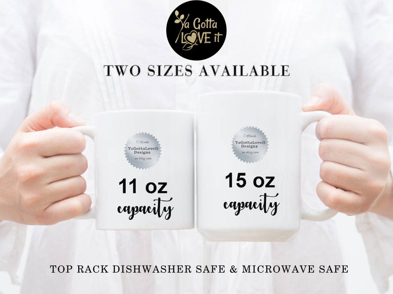 May include: Two white ceramic mugs with black text. The mug on the left is 11 ounces and the mug on the right is 15 ounces. Both mugs are dishwasher and microwave safe.