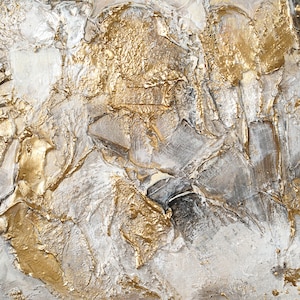May include: Abstract painting with textured gold and white paint. The paint is applied in thick layers, creating a dynamic and modern look.