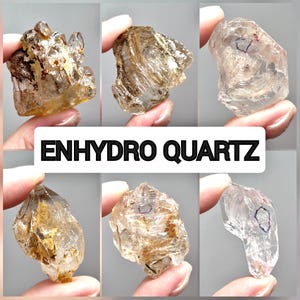 May include: A collection of six Enhydro Quartz crystals, each held in a hand. The crystals range in colour from clear to light brown, with visible inclusions and internal structures. The text "ENHYDRO QUARTZ" is displayed in a white rectangle.