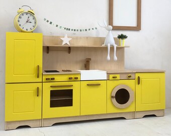 A wooden kitchen for children in an original style, unique handicraft, solid and safe, natural wood