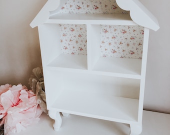 small cute dollhouse made of wood, retro dollhouse on legs, white house with a flower motif, mouse house, handmade