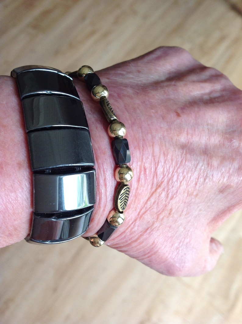 Magnetic Hematite Tube Bead Necklace with Deep Gold Leaf Embossed Accents and Gold Metal Beads