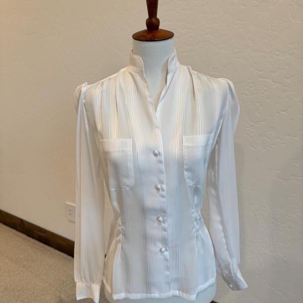Blusa blanca a rayas transparente talla 6