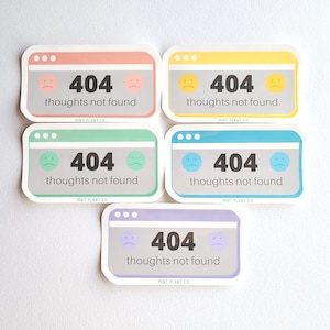 May include: Five colourful stickers with a browser window design. Each sticker features a sad face emoji, the number 404, and the text "thoughts not found". The stickers are in shades of pink, yellow, green, blue, and purple.