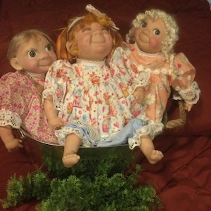 Set of 3 vinyl reborn dolls with cloth body and COA