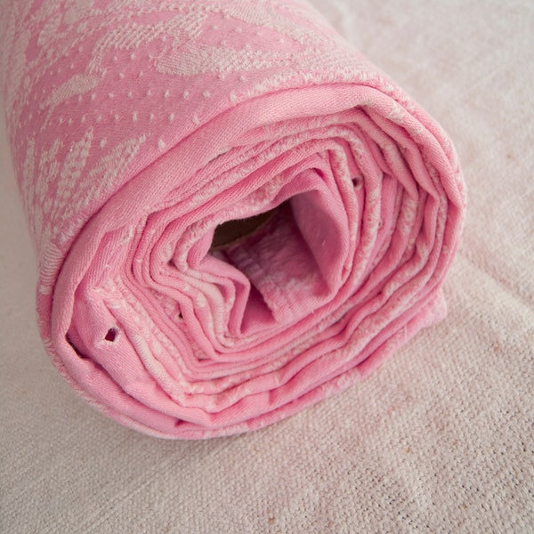 Antieke kauwgomroze stof voor wollen matras, gemaakt van damastkatoen. jaren dertig.